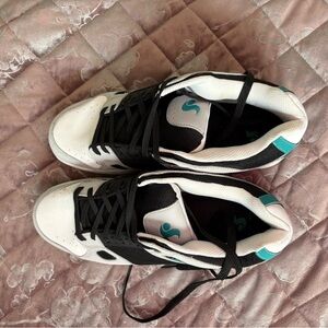 Classic Black and White Sneakers with Teal Accents